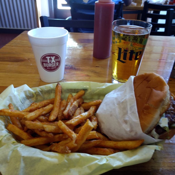 Firecracker burger, seasoned fries and strawberry ale from Shiner on 4-7 happy hour.