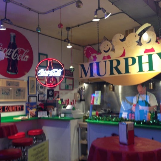 Photo taken at Murphy&#39;s Red Hots by C L. on 12/14/2012