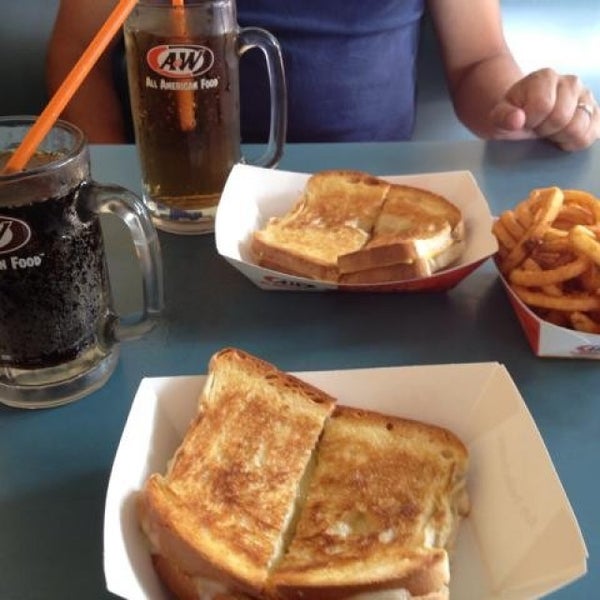 Photo taken at A&amp;W Restaurant by Lisa I. on 7/27/2013