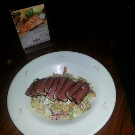 Photo taken at Outback Steakhouse by Gisselle C. on 2/27/2013