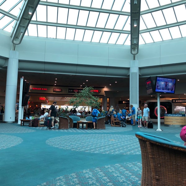 Photo taken at Orlando International Airport (MCO) by Gisele on 6/30/2018