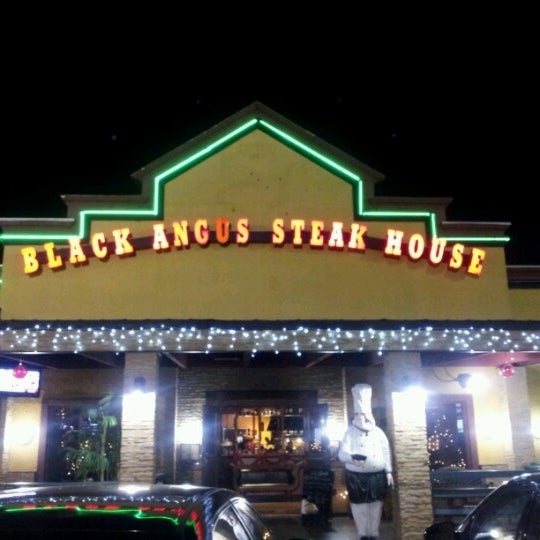 Photo taken at Black Angus Steakhouse by Manuel G. on 12/22/2012