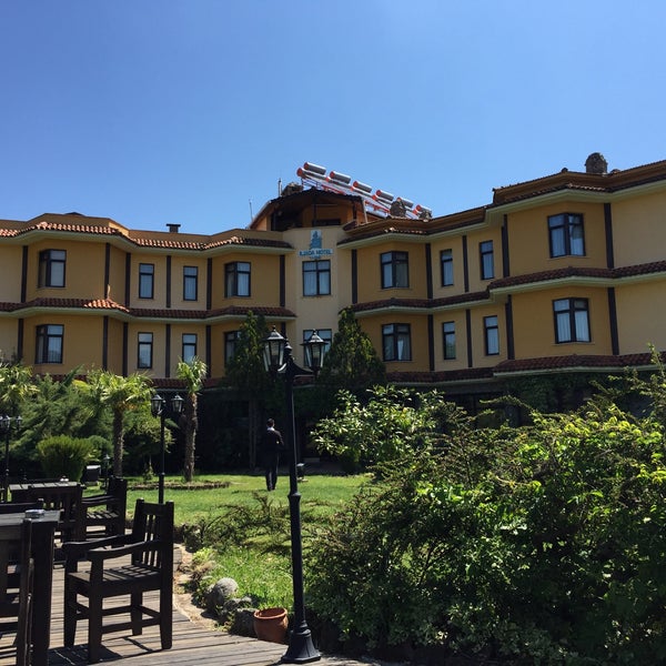 Photo taken at Iliada Hotel by Aydogan C. on 5/13/2015