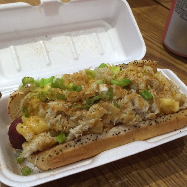 Photo taken at Greatest American Hot Dogs by Fawad G. on 4/1/2015