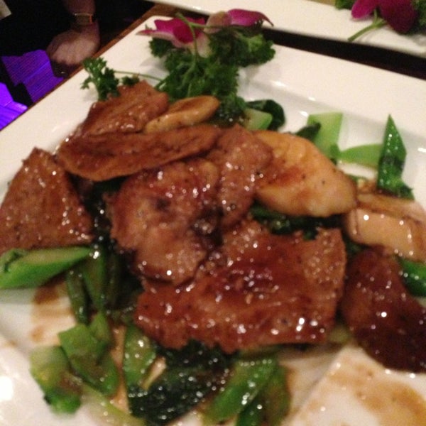 Photo taken at Wild Ginger Pan-Asian Vegan Cafe by Jennifer P. on 1/18/2013