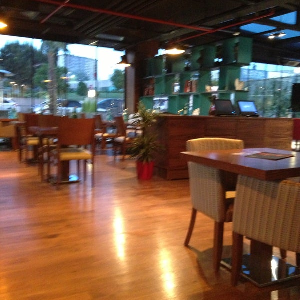 Photo taken at Manji Cafe &amp; Restaurant by Turgut U. on 5/24/2013