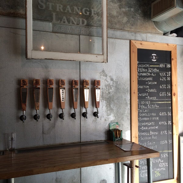 Photo taken at Strange Land Brewery by Amanda G. on 7/25/2015