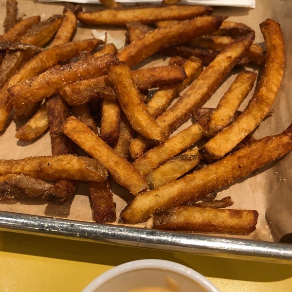 Photo taken at MOOYAH Burgers, Fries &amp; Shakes by Lena C. on 2/27/2019