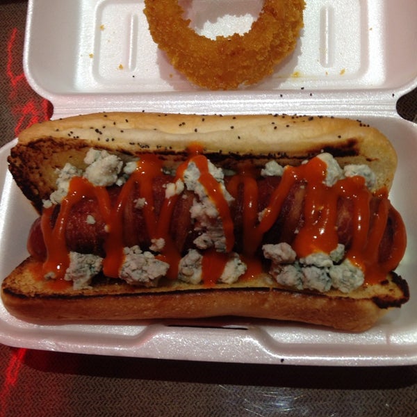Photo taken at Greatest American Hot Dogs by Dub G. on 3/2/2014