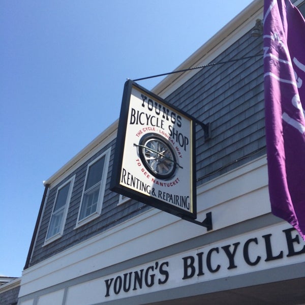 Photo taken at Young&#39;s Bicycle Shop by Cat L. on 7/3/2014