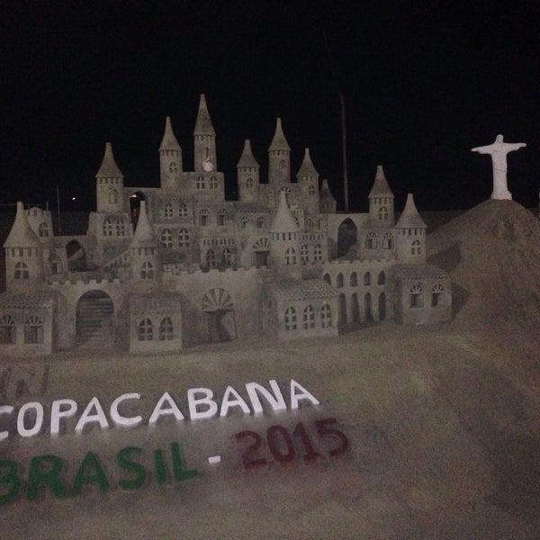 Photo taken at Copacabana Beach by Mahmut Y. on 4/17/2015