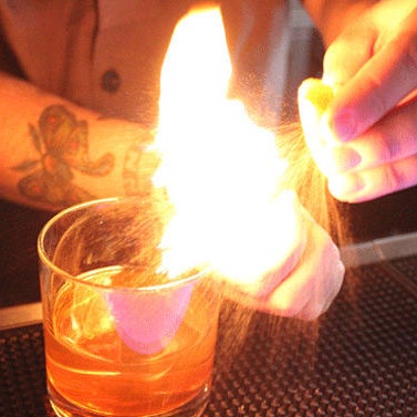 "Set to Kill" features twelve-year bourbon, Booker's bourbon, Cynar, green Chartreuse and house-made tamarind bitters and topped with a flamed orange peel. http://bit.ly/1adc8Du