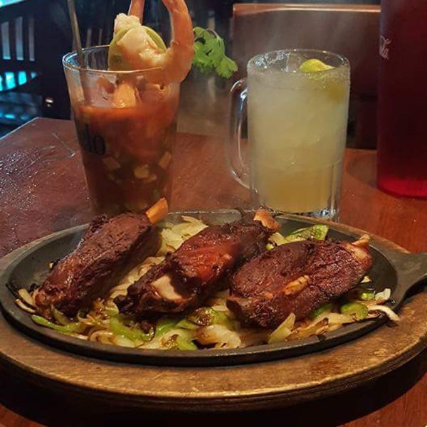 Love this plate called Redneck Fajitas . So tender it simply falls off the bone. And their margaritas are the best . They are made in a smoothie type machine. Great tasting!