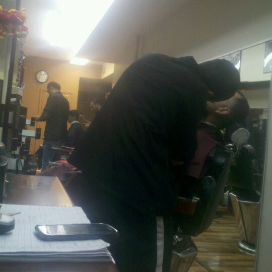 Photo taken at East 6th Street Barber Shop by Jerry P. on 10/24/2012