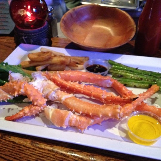 Photo taken at King Crab Tavern &amp; Seafood Grill by Emma N. on 11/22/2012