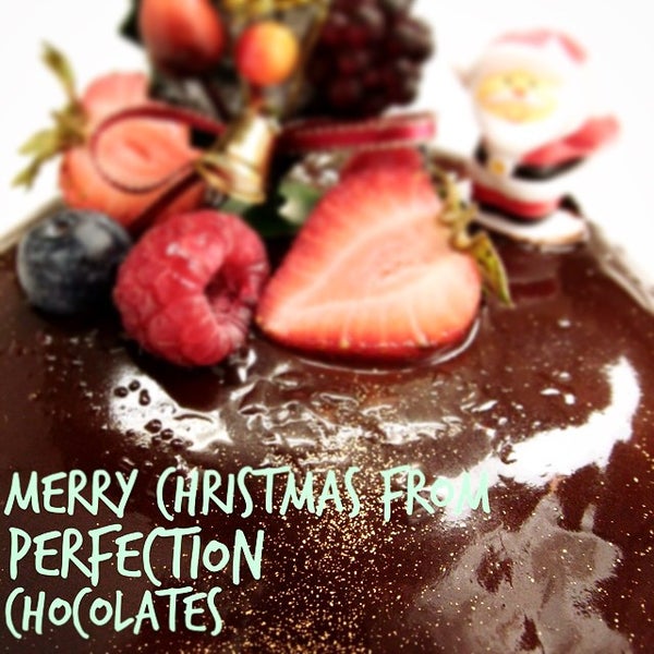 Снимок сделан в Perfection Chocolates &amp; Sweets пользователем J K. 12/25/2014
