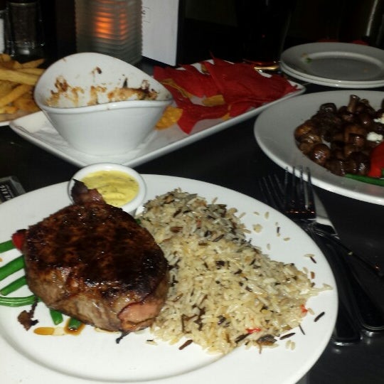 Photo taken at The Keg Steakhouse + Bar - 4th Ave by Rickie B. on 4/30/2014
