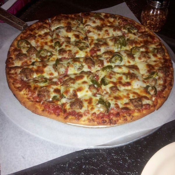 Photo taken at Nancy&#39;s Chicago Pizza by Kyann F. on 5/7/2013