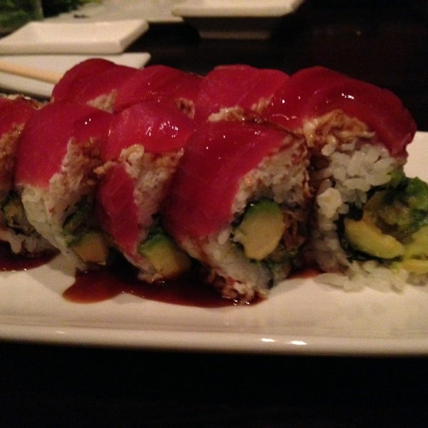 Photo taken at Okura Robata Sushi Bar and Grill by Andy H. on 3/17/2013