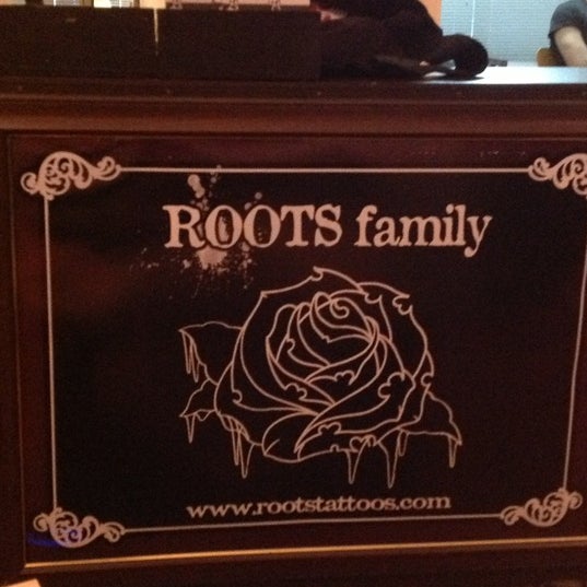 Photo taken at Roots Tattoo by Gamze A. on 10/1/2012