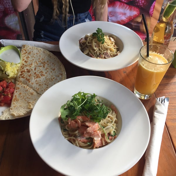 Photo taken at OLÁ Bar &amp; Restaurant by Tanya F. on 5/10/2017