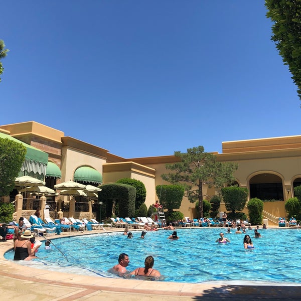 Photo taken at Wynn Las Vegas Pool by Sam R. on 7/4/2019