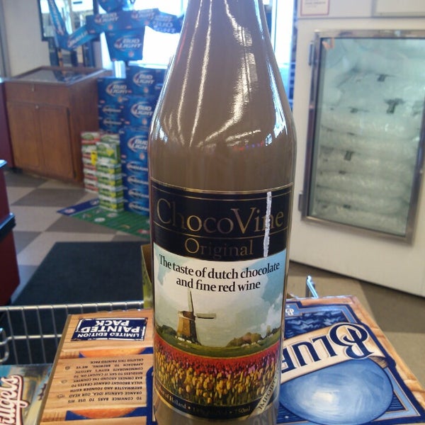 Photo taken at St Anthony Village Wine and Spirits by A Sent One .. on 8/22/2013