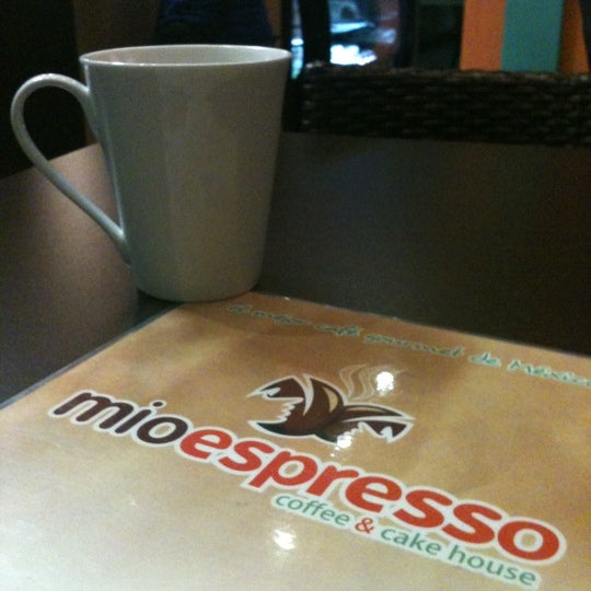 Photo taken at Mioespresso Coffee &amp; Cake House by Aracely G. on 12/27/2012