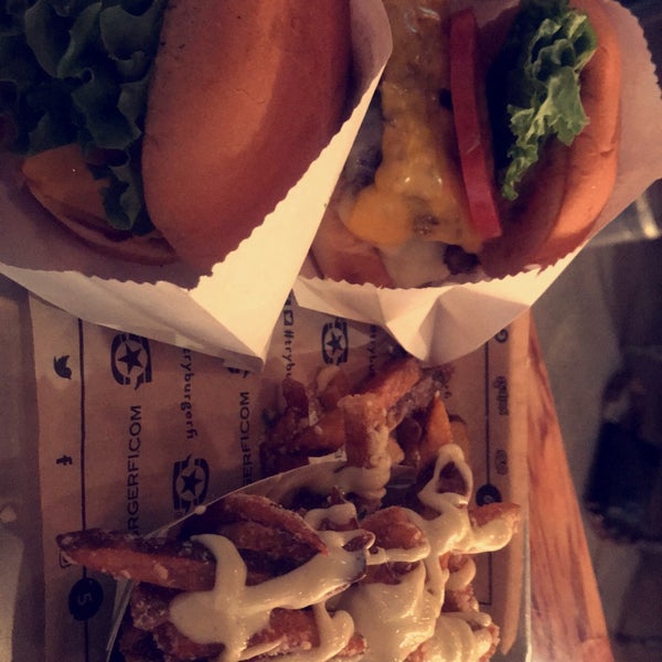 Photo taken at BurgerFi by M on 3/14/2018