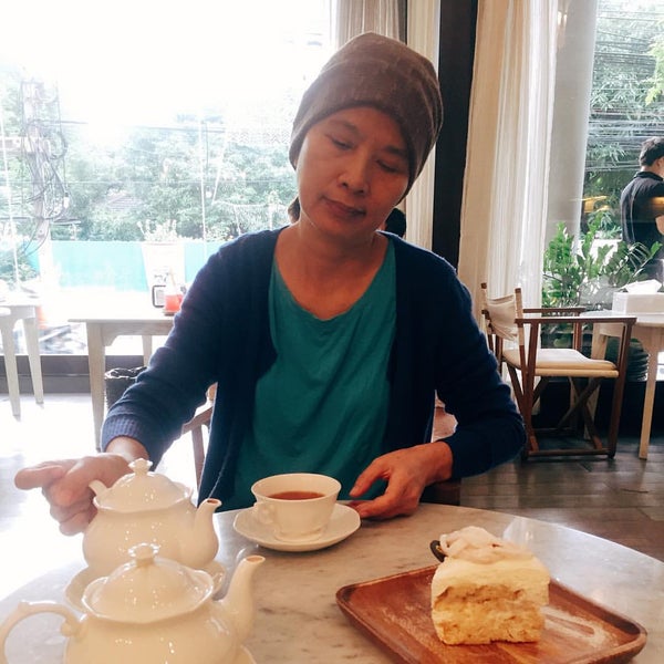 Photo taken at BigKnit Cafe by Thu V. on 10/1/2015