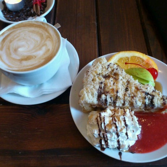 Photo taken at Sweetday Cafe by Dinara S. on 2/14/2013