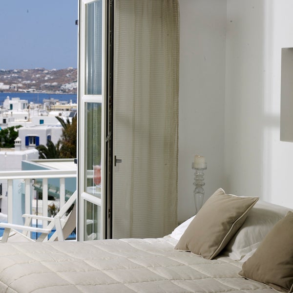 The newly renovated Luxury Superior Double Sea View Rooms of the Semeli Mykonos hotel offer magnificent views of Mykonos town and the sea!
