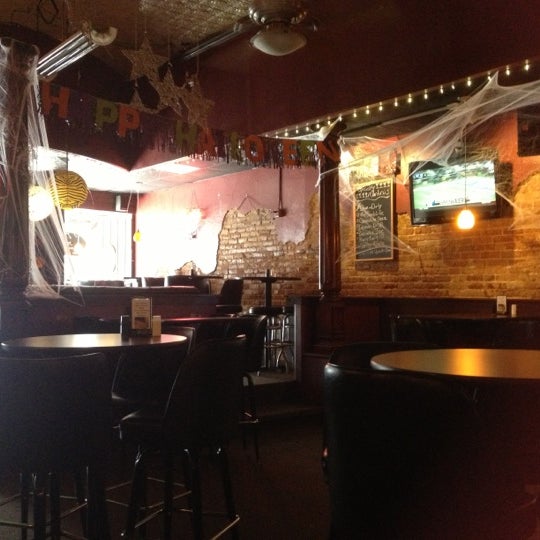 Photo taken at Rain Cafe &amp; Lounge by Lisa W. on 10/29/2012