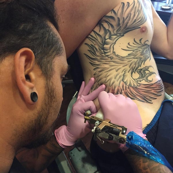 Photo taken at Triple Diamond Tattoo by Shannon M. on 10/8/2015