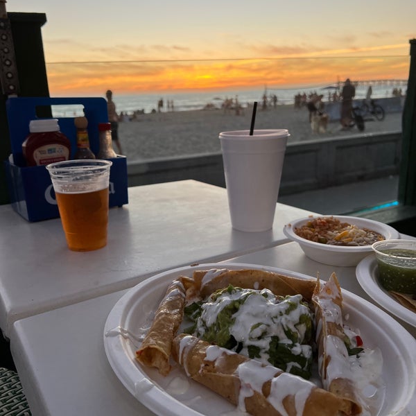 Photo taken at Baja Beach Cafe by Nick on 8/11/2022