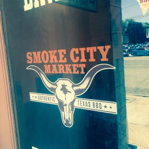 Photo taken at Smoke City Market by Mitchell S. on 7/4/2014