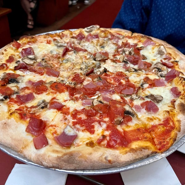 Photo taken at John&#39;s Pizzeria by Michael M. on 5/27/2022