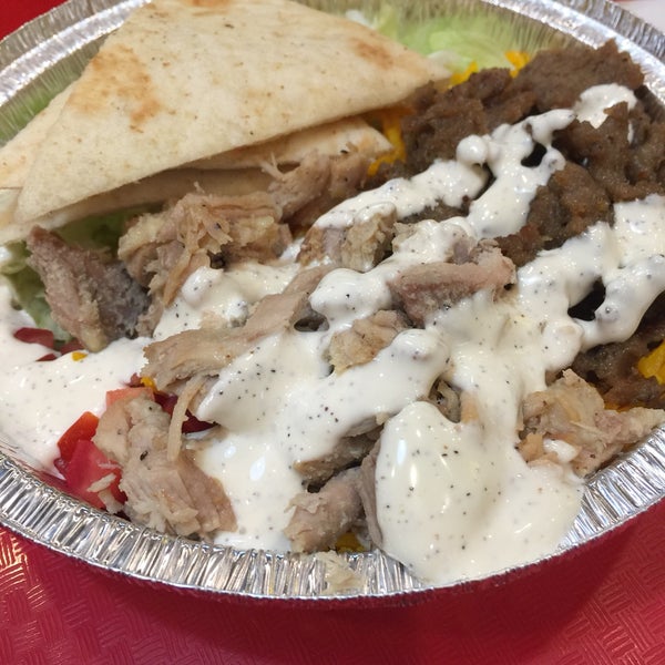 Photo taken at The Halal Guys by Nigel C. on 12/11/2017