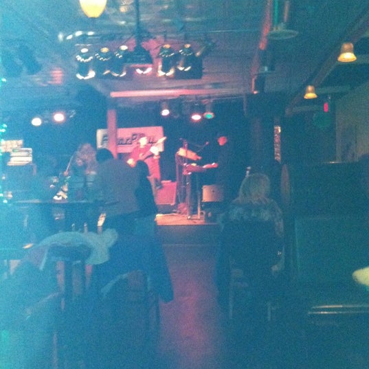 Photo taken at US-12 Bar &amp; Grill by Catherine K. on 11/17/2012