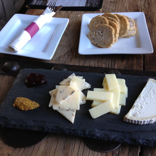 The the three cheese sampler. Choose your fav cheese.  Cheeses served on a real slate stone!  How nice