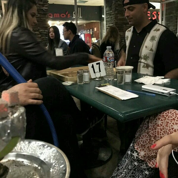 Photo taken at Momo&#39;s Grill Hookah by Closed on 3/15/2017