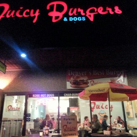 Photo taken at Juicy Burgers &amp; Dogs by Justin W. on 11/19/2012