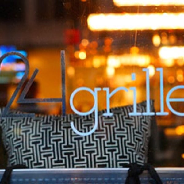 Photo taken at 24 Grille by Will on 10/8/2014