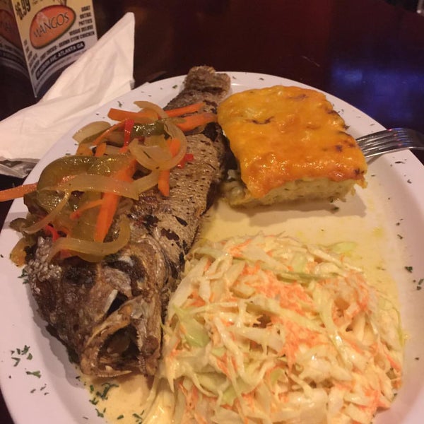 Foto tirada no(a) Mangos Caribbean Restaurant por Matthew &quot;True&quot; N. em 12/5/2015