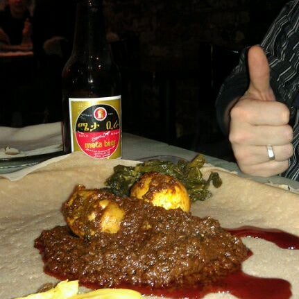 Photo taken at Bati Ethiopian Restaurant by Russ B. on 2/4/2012