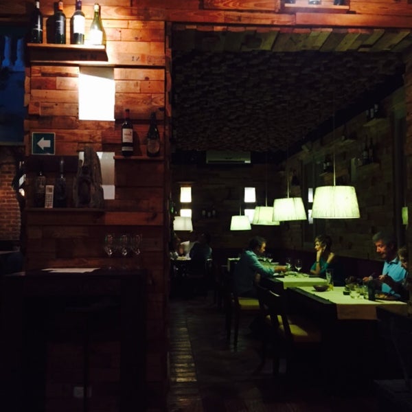 Photo taken at Restaurante El Santísimo by Fer V. on 4/18/2015