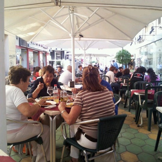 Photo taken at Cerveceria Capri by JUAN LUIS P. on 9/29/2012