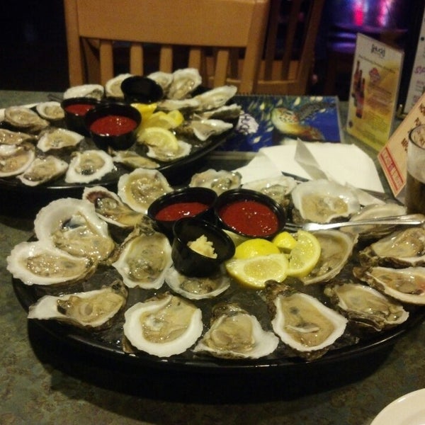 Photo taken at Shucks Tavern &amp; Oyster Bar by Janet M. on 8/30/2013