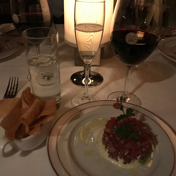 The $85 wine dinner might be the best deal in NYC. Three courses, unlimited wine (yes very unlimited) and it's actually good food. Branzino is a must try for non-steak lovers