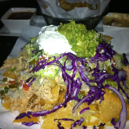 Foto diambil di Yucatan Taco Stand oleh Paige S. pada 12/12/2012